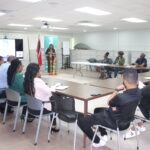Vidjaya Ramkhalawan – Manager, Permitting, welcoming attendees at the session